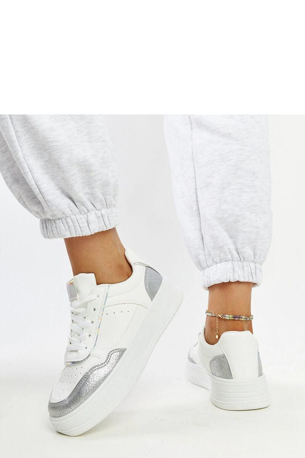   Biało-srebrne sneakersy na grubszej podeszwie Rumai - Solea 