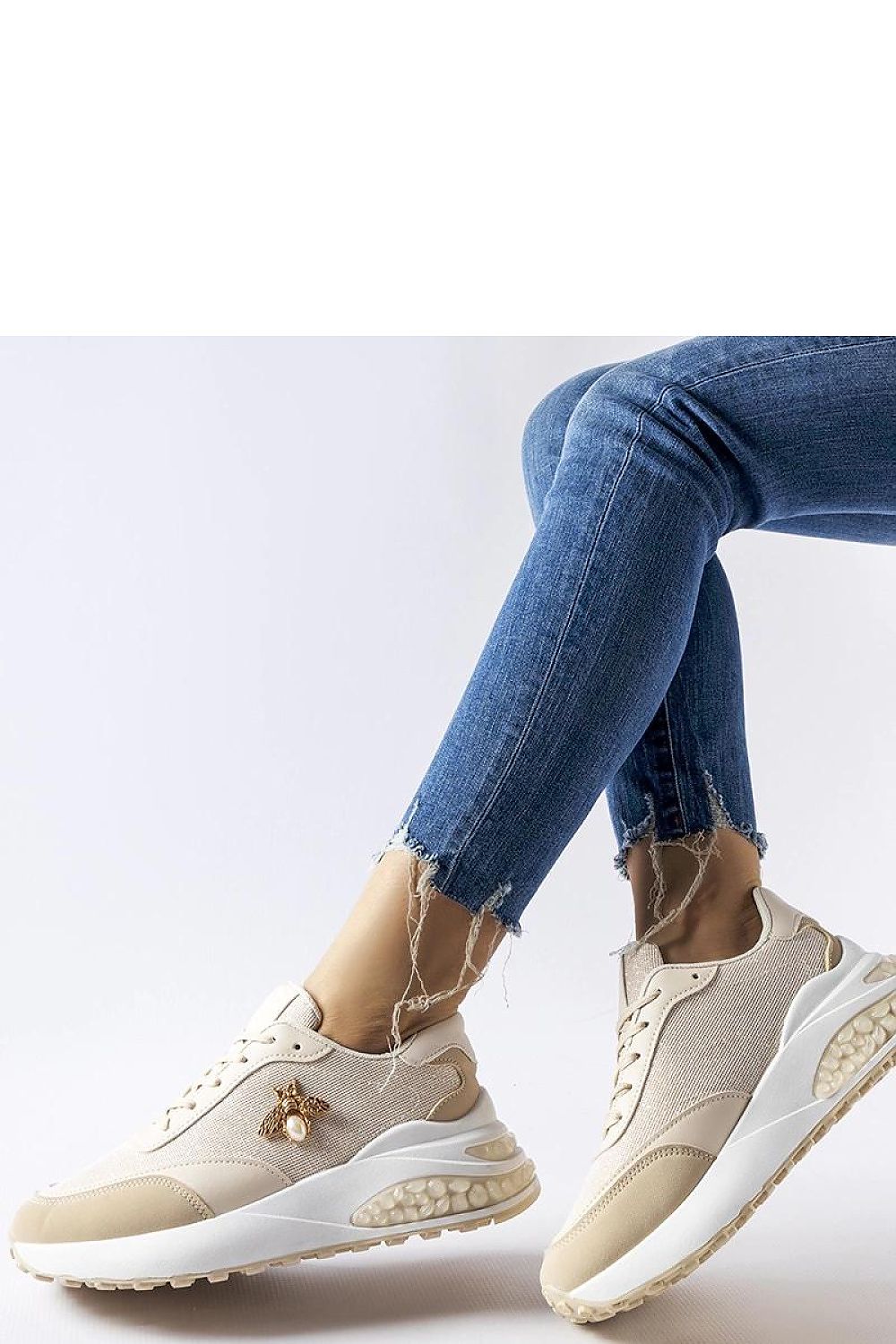   Beżowo-białe sneakersy z ozdobną nitką Acciano - Solea 