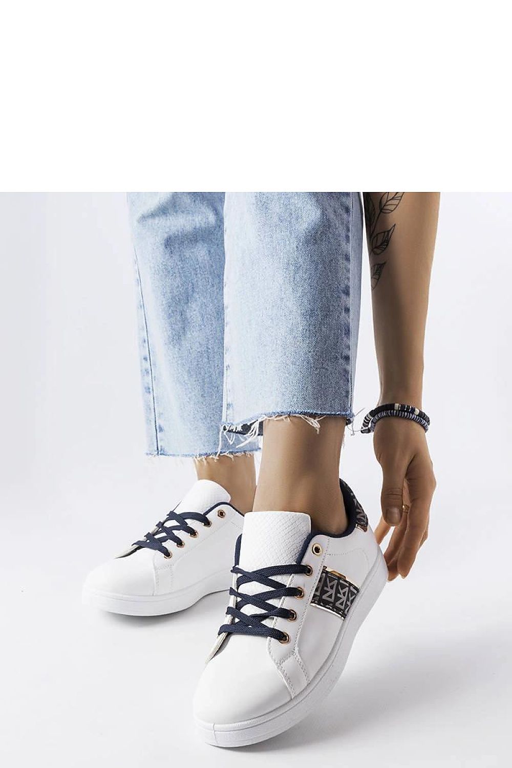   Białe sneakersy ze zdobioną cholewką Sauriol - Solea 